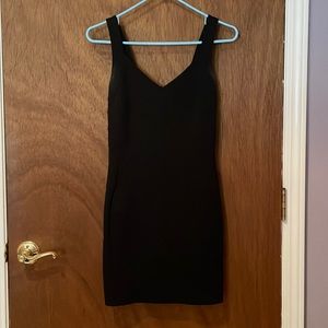 Tiny black cocktail dress.